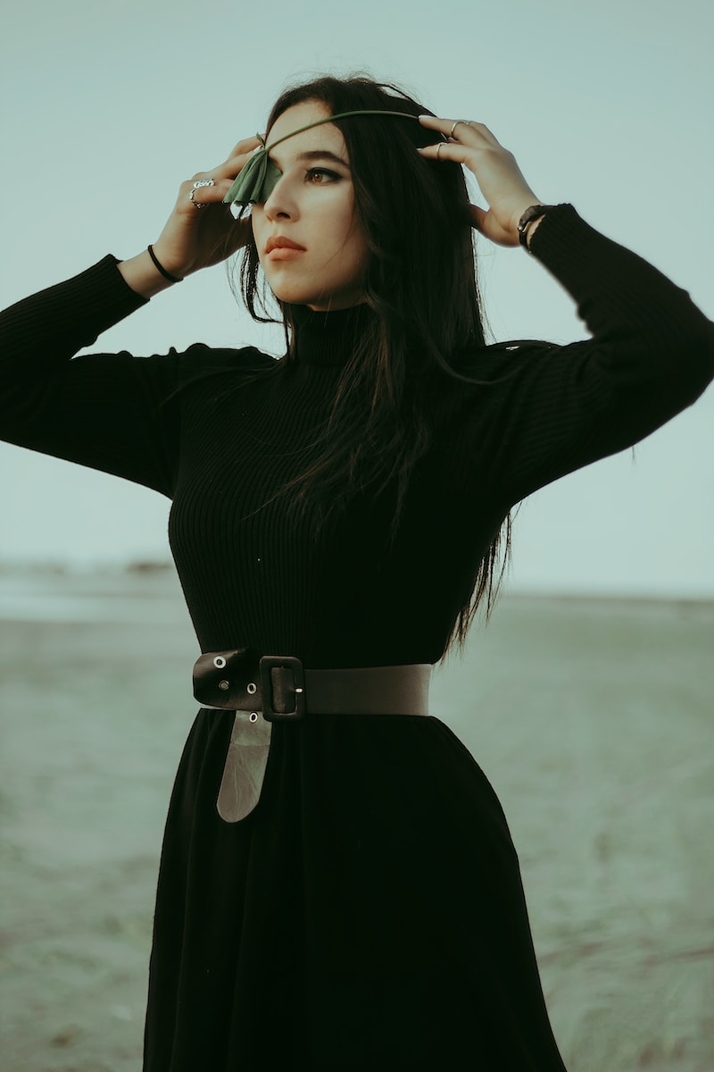 woman in black long sleeve dress