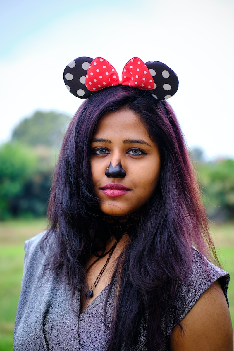 a woman with a minnie mouse ears on her head