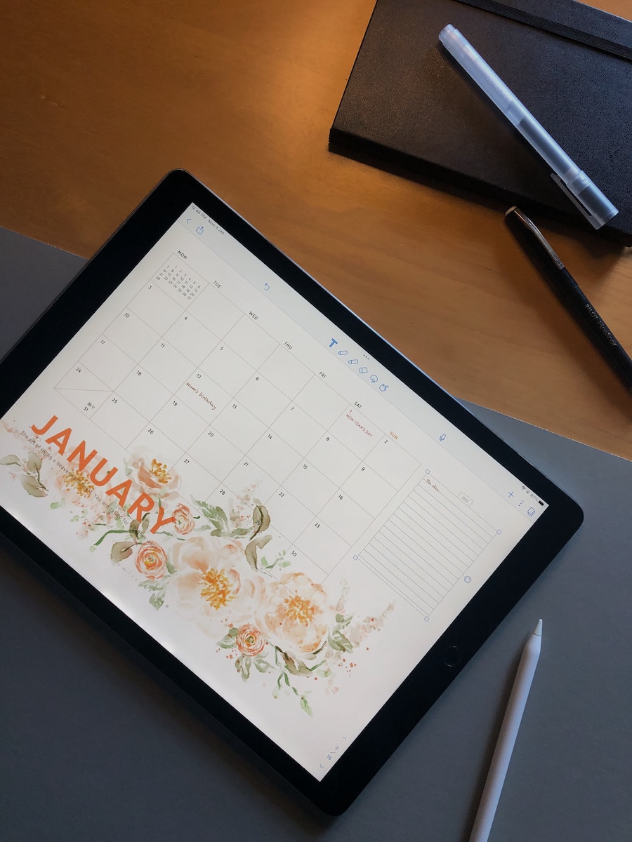 a tablet with a calendar on the screen